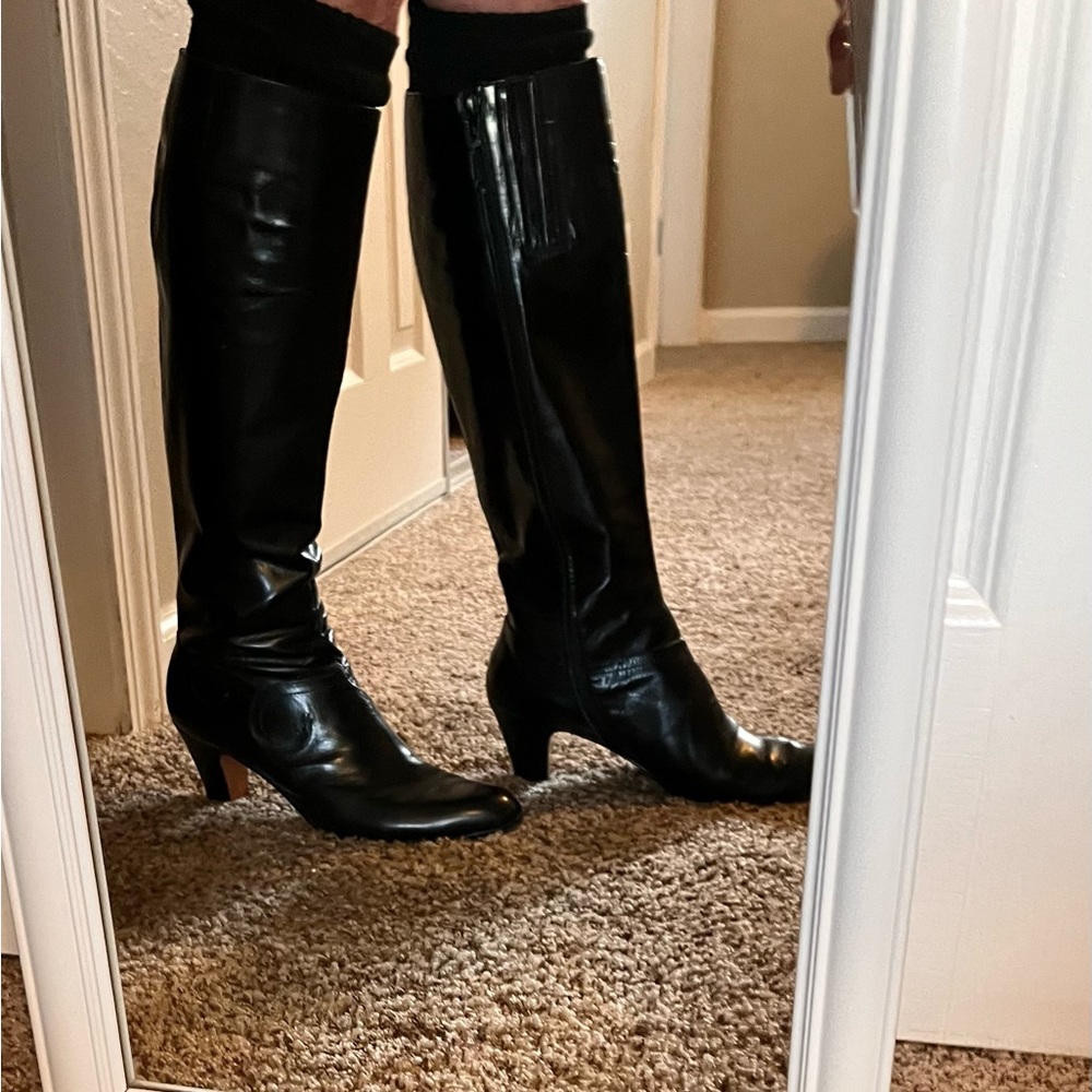 Salvatore Ferragamo vintage 3” heel gusseted black boots with swirling details.